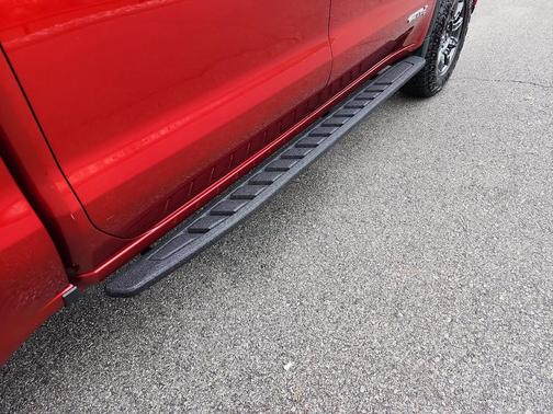 Volcanic Red Tintcoat 2024 GMC Sierra 1500 AT4