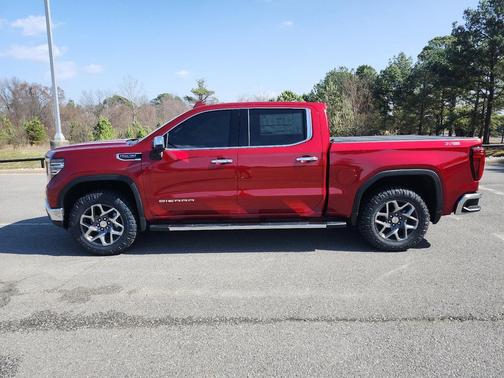 Volcanic Red Tintcoat 2026 GMC Sierra 1500 SLT