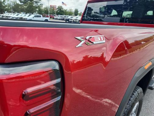 Volcanic Red Tintcoat 2025 GMC Sierra 2500 SLT