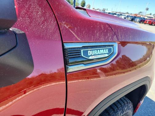Volcanic Red Tintcoat 2026 GMC Sierra 1500 AT4