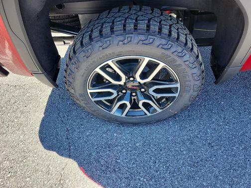 Volcanic Red Tintcoat 2026 GMC Sierra 1500 AT4