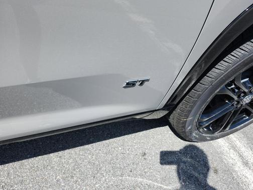 Stone Metallic 2026 Buick Enclave Sport Touring