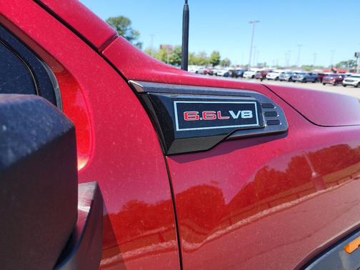 Volcanic Red Tintcoat 2026 GMC Sierra 2500 AT4X