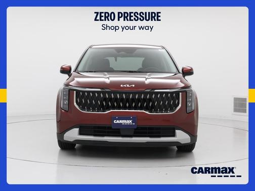 Burgundy 2025 Kia Carnival LXS