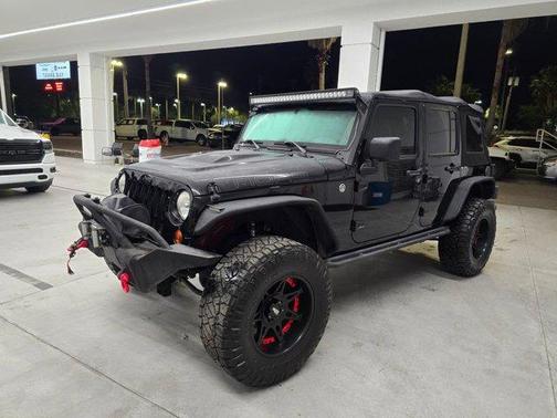 Black 2013 Jeep Wrangler Unlimited Sahara