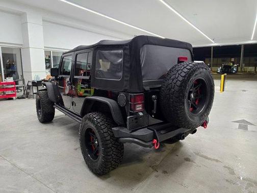 Black 2013 Jeep Wrangler Unlimited Sahara