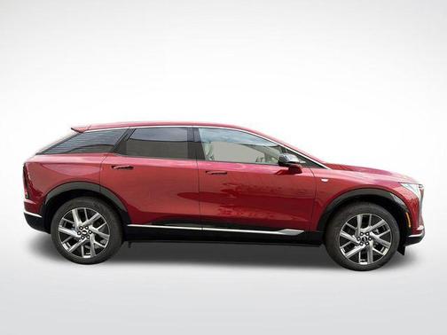 Radiant Red Tintcoat 2026 Cadillac OPTIQ Luxury