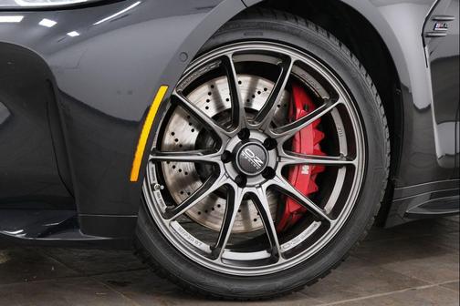 Black Sapphire Metallic 2024 BMW M4 Competition xDrive