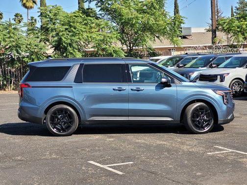 Astra Blue 2026 Kia Carnival Hybrid SX Prestige