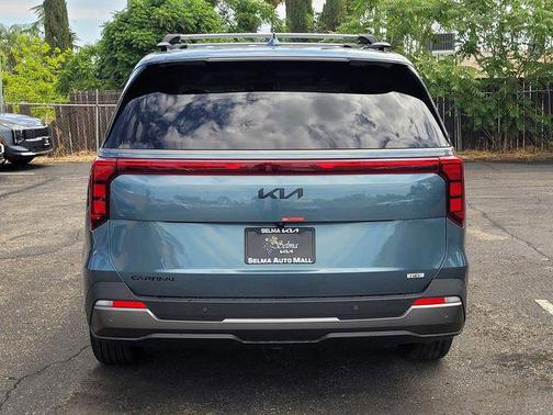 Astra Blue 2026 Kia Carnival Hybrid SX