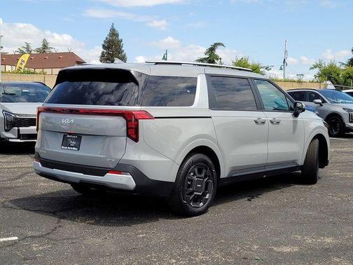 Ceramic Silver 2026 Kia Carnival Hybrid EX