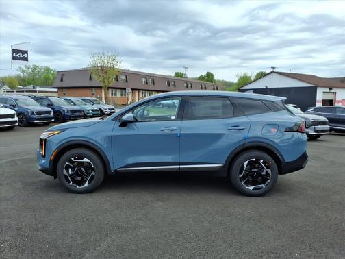 Heritage Blue 2026 Kia Sportage SX Turbo
