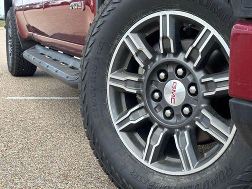 Volcanic Red Tintcoat 2024 GMC Sierra 1500 AT4