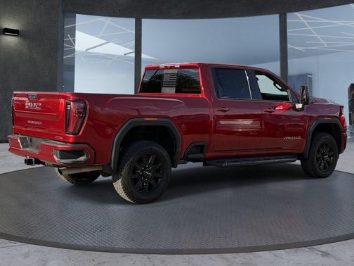 Volcanic Red Tintcoat 2025 GMC Sierra 2500 AT4