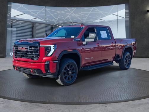 Volcanic Red Tintcoat 2025 GMC Sierra 2500 AT4
