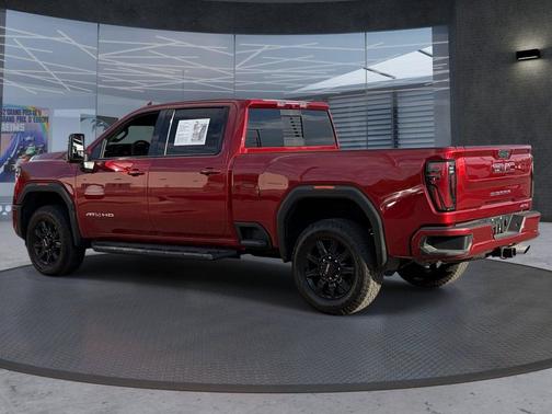 Volcanic Red Tintcoat 2025 GMC Sierra 2500 AT4