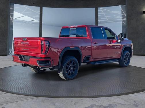 Volcanic Red Tintcoat 2025 GMC Sierra 2500 AT4