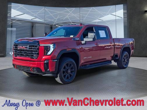 Volcanic Red Tintcoat 2025 GMC Sierra 2500 AT4