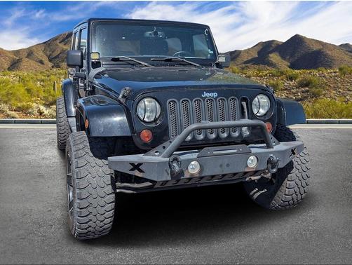 Black 2013 Jeep Wrangler Unlimited Sahara