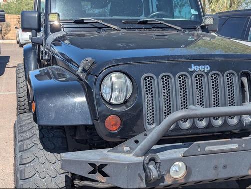 Black 2013 Jeep Wrangler Unlimited Sahara