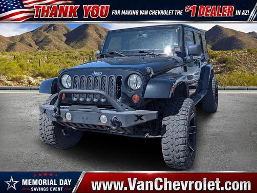 Black 2013 Jeep Wrangler Unlimited Sahara