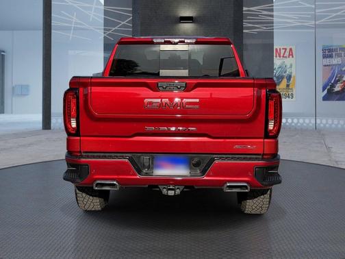 Volcanic Red Tintcoat 2023 GMC Sierra 1500 AT4