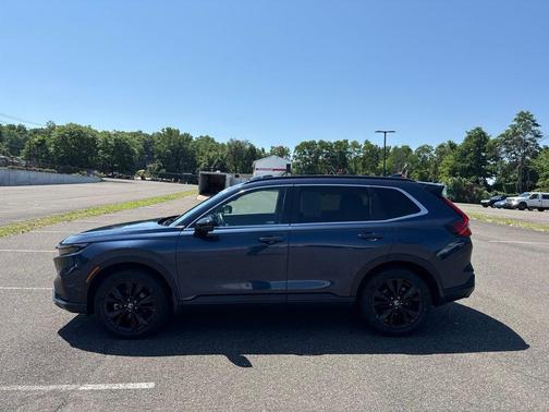 Canyon River Blue Metallic 2024 Honda CR-V Hybrid Sport Touring AWD