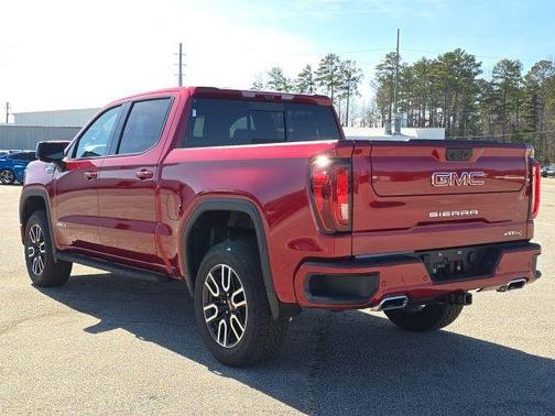 Volcanic Red 2025 GMC Sierra 1500 AT4