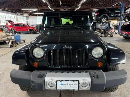 Black Clearcoat 2011 Jeep Wrangler Unlimited Sahara