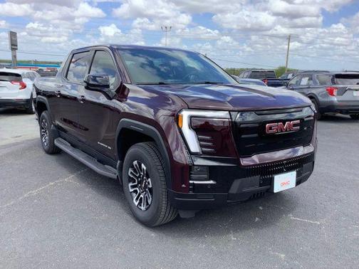 Dark Ember Metallic 2026 GMC Sierra EV Standard Range Elevation