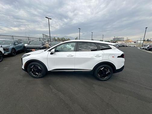 White 2026 Kia Sportage EX