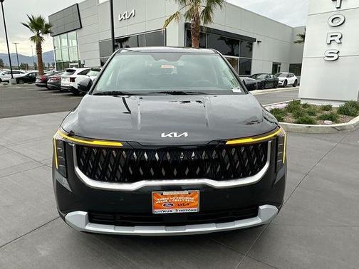 Gray 2026 Kia Carnival Hybrid LXS