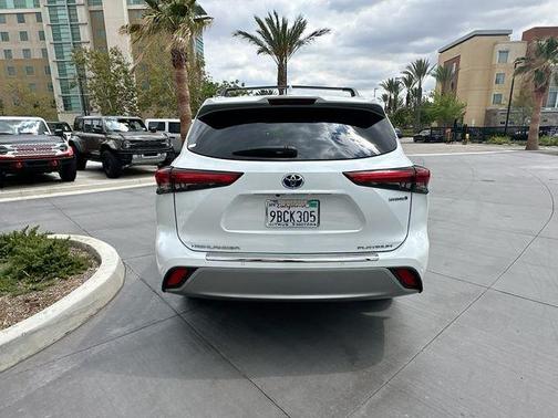 Red 2022 Toyota Highlander Hybrid Platinum