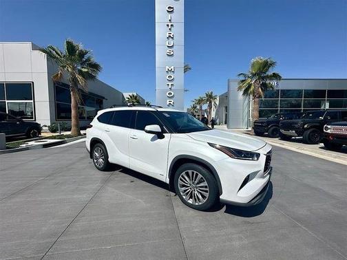 Red 2022 Toyota Highlander Hybrid Platinum