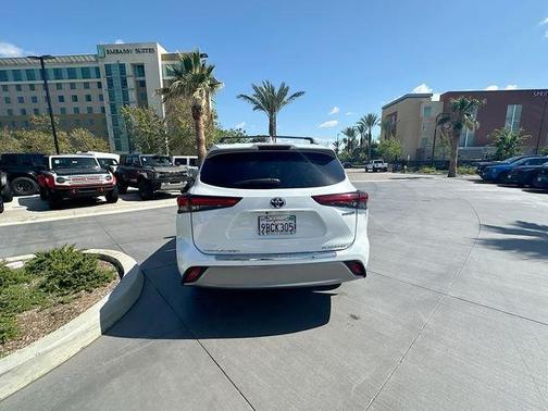 Red 2022 Toyota Highlander Hybrid Platinum
