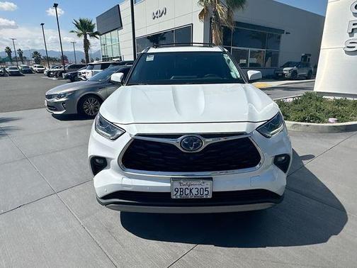 Red 2022 Toyota Highlander Hybrid Platinum