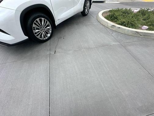 Red 2022 Toyota Highlander Hybrid Platinum