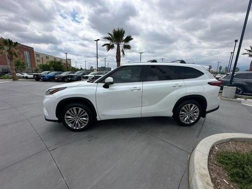 Red 2022 Toyota Highlander Hybrid Platinum