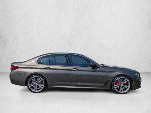 Carbon Black Metallic 2023 BMW M550 i Xdrive