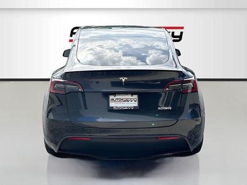 Solid Black 2024 Tesla Model Y Performance Dual Motor All-Wheel Drive