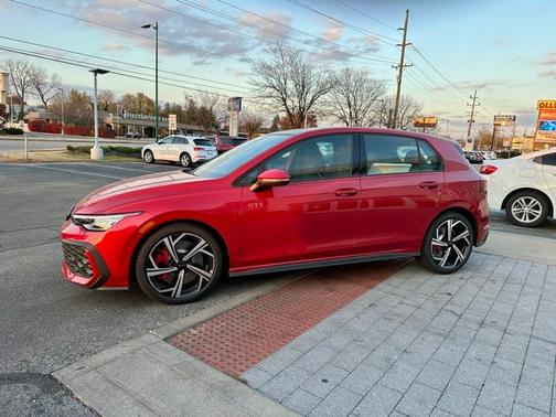 Red Metallic 2026 Volkswagen Golf GTI 2.0T SE