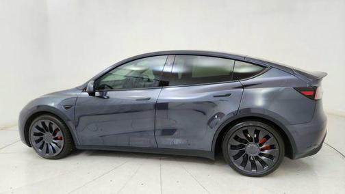 Solid Black 2025 Tesla Model Y Performance Dual Motor All-Wheel Drive