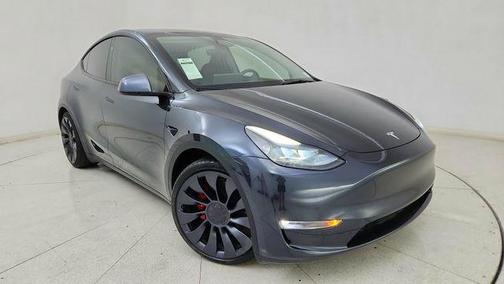 Solid Black 2025 Tesla Model Y Performance Dual Motor All-Wheel Drive