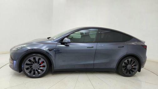 Solid Black 2025 Tesla Model Y Performance Dual Motor All-Wheel Drive