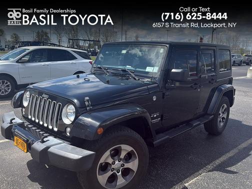 Black 2016 Jeep Wrangler Unlimited Sahara