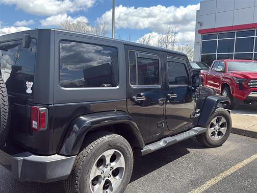 Black 2016 Jeep Wrangler Unlimited Sahara