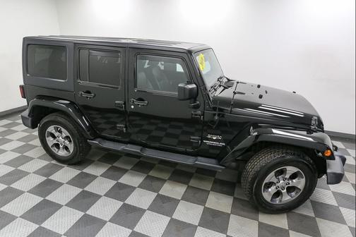 Black 2016 Jeep Wrangler Unlimited Sahara