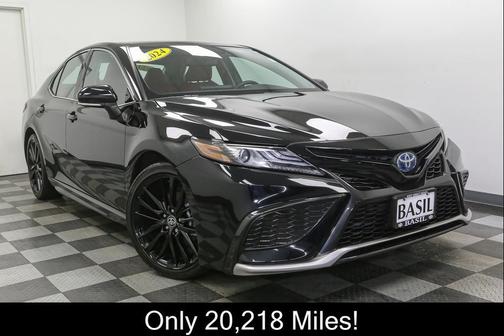 Midnight Black Metallic 2024 Toyota Camry Hybrid SE