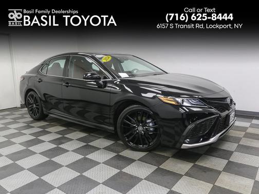 Midnight Black Metallic 2024 Toyota Camry Hybrid SE