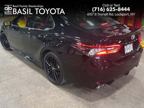 Midnight Black Metallic 2024 Toyota Camry Hybrid SE